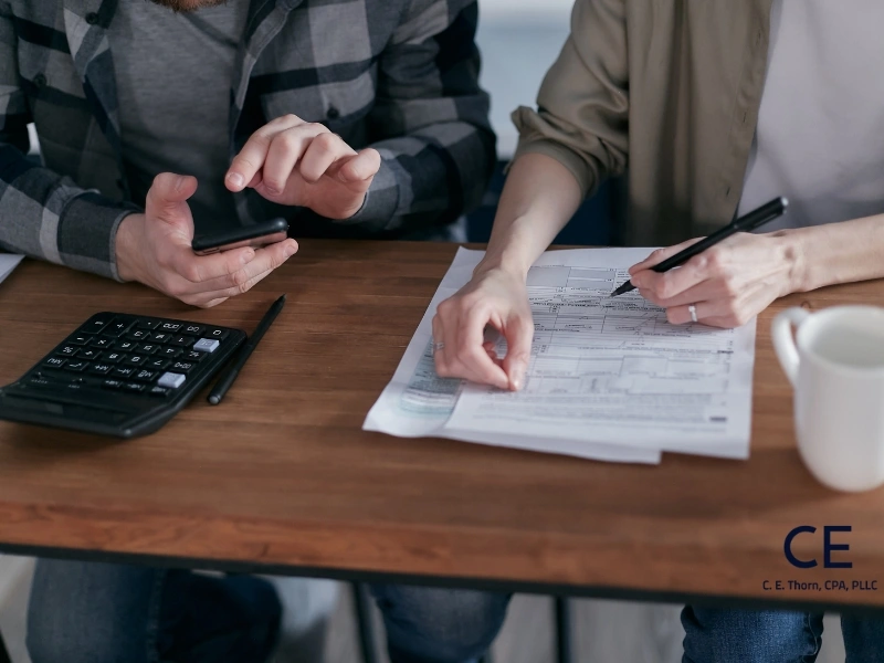 small business owners prepare taxes. Their CPA addresses "are tax preparation fees deductible?" 