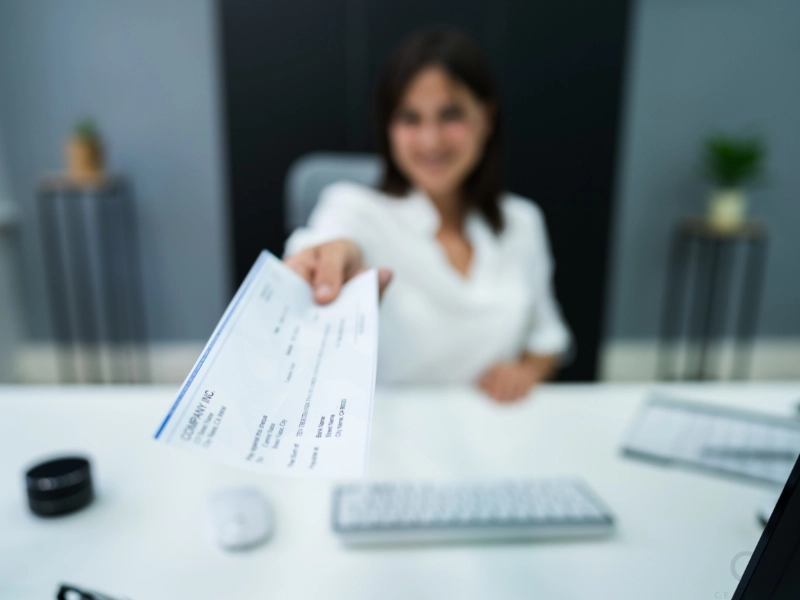 Employee payroll check handing. list of expenses for business, business expense categories