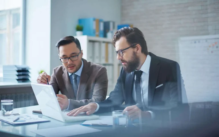 Two Raleigh CPAs review financial statements.